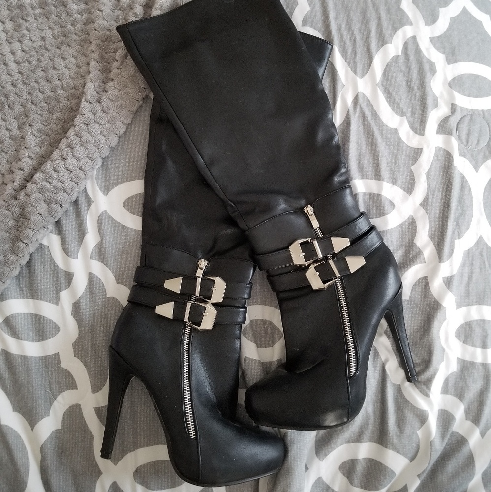 High heeled high boots